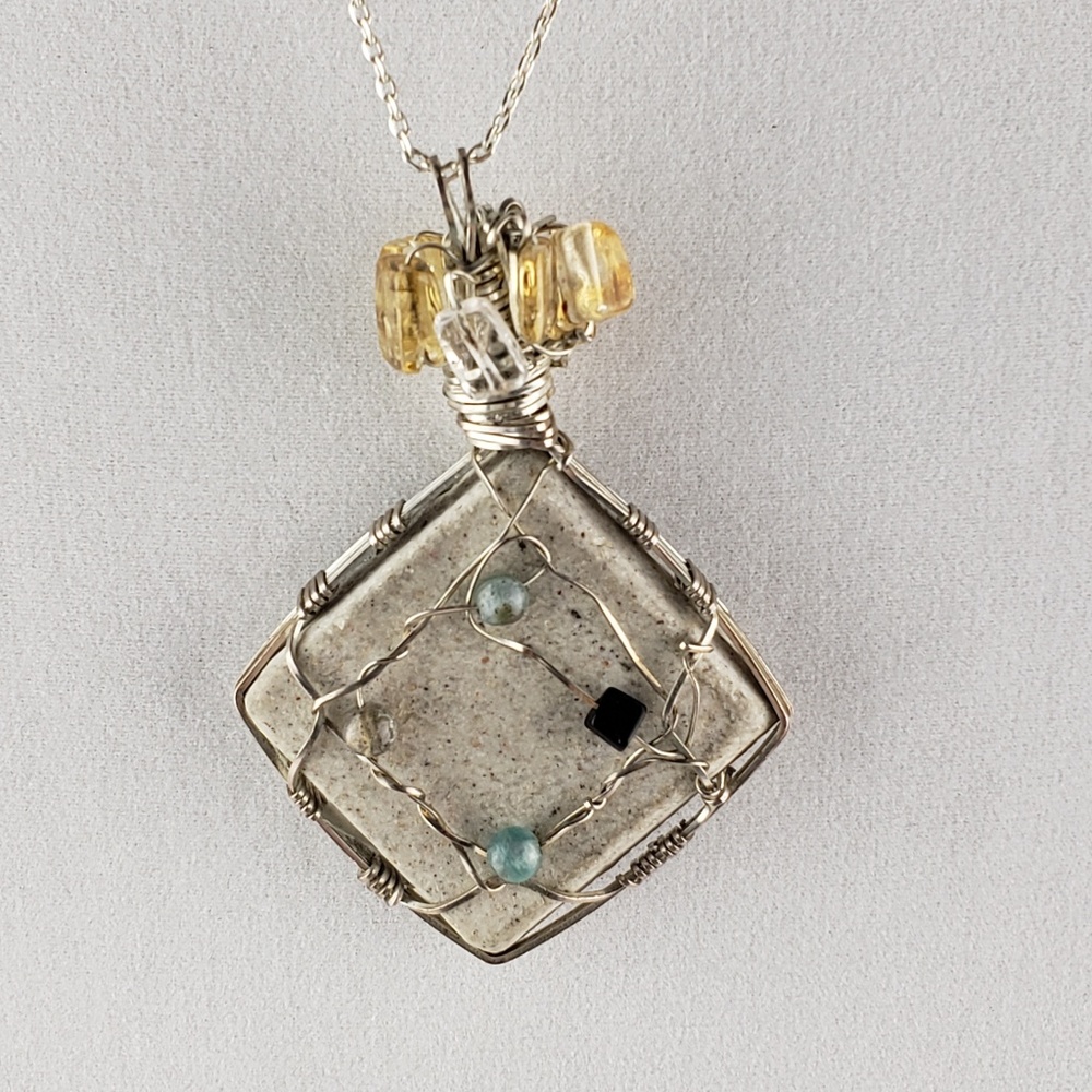 Wire wrap 'power' stone pendant